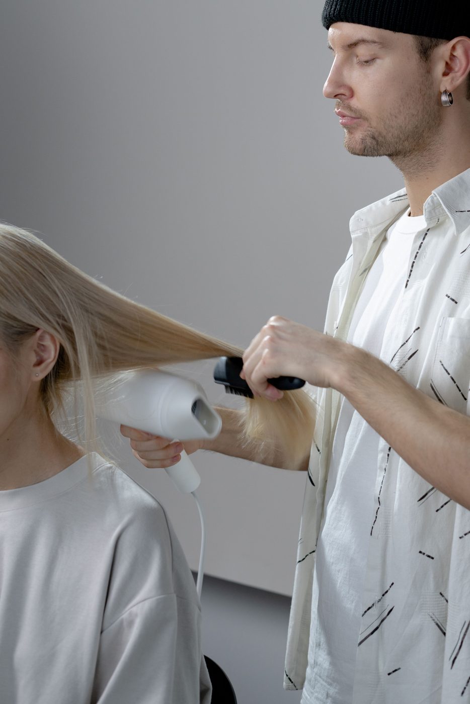 Licensed stock photograph: a blow-dry in progress.